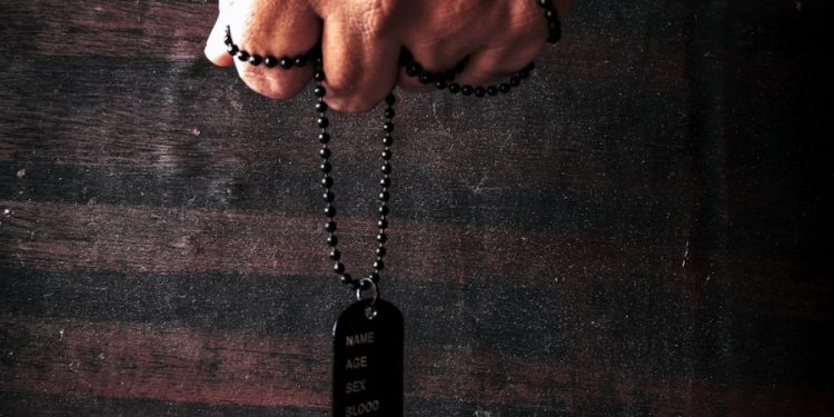 person holding black samsung remote control