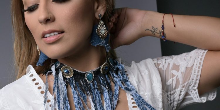 a woman with her eyes closed