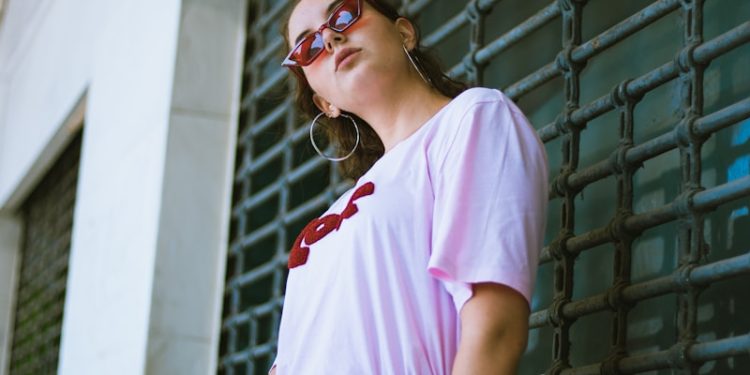 woman standing in front of gate