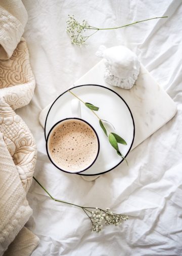 white teacup filled with coffee