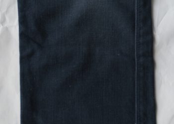 black textile on white textile