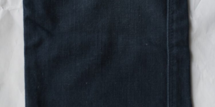 black textile on white textile