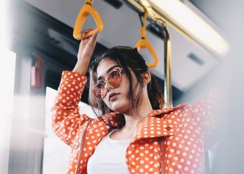 woman standing inside vehicle