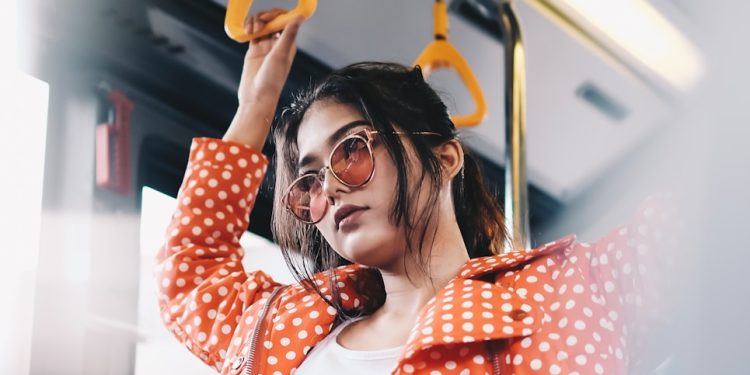 woman standing inside vehicle