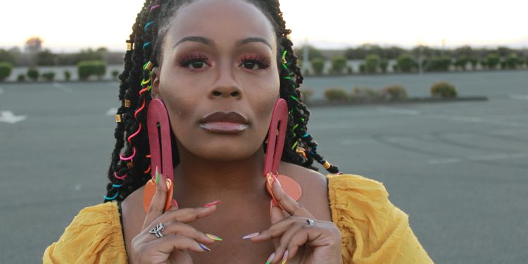 a woman holding her hands up