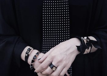 a person holding a tie